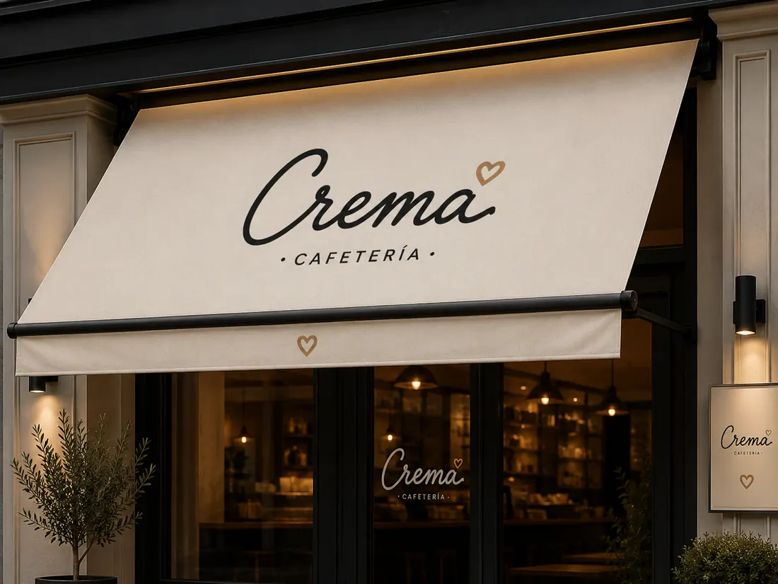 Toldo de la cafetería Crema con la marca aplicada sobre la entrada