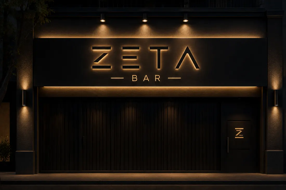 Frente de Zeta Bar de noche con letras corpóreas retroiluminadas